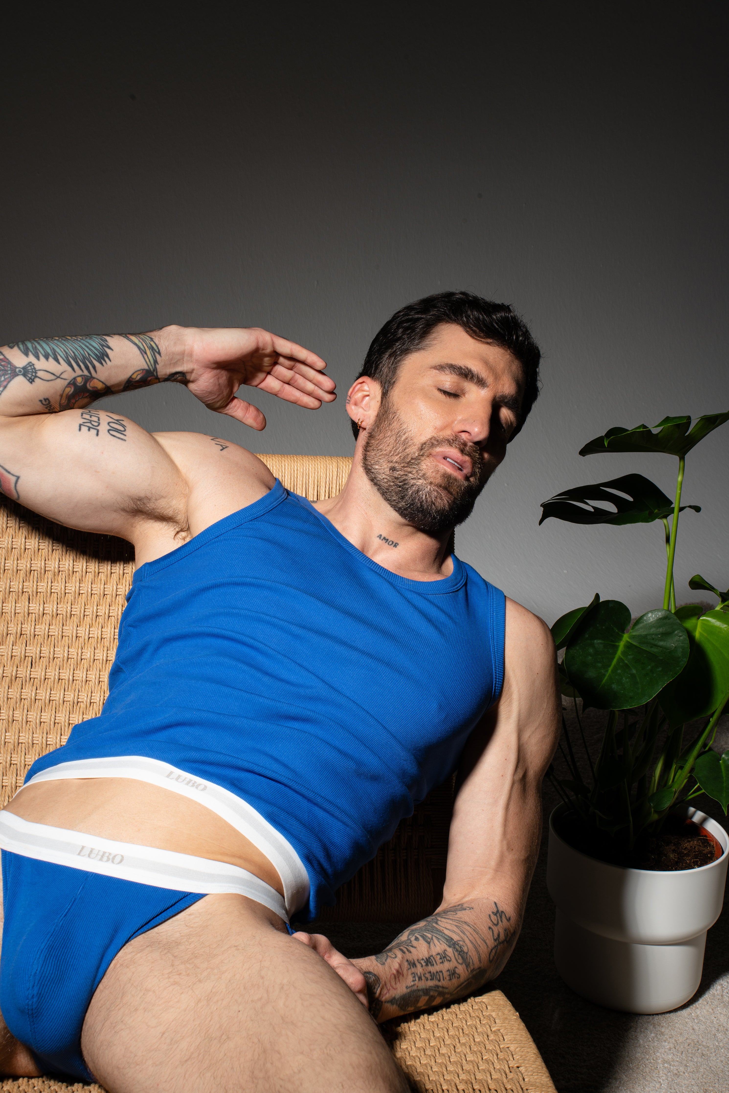 a man in lubo blue underwear